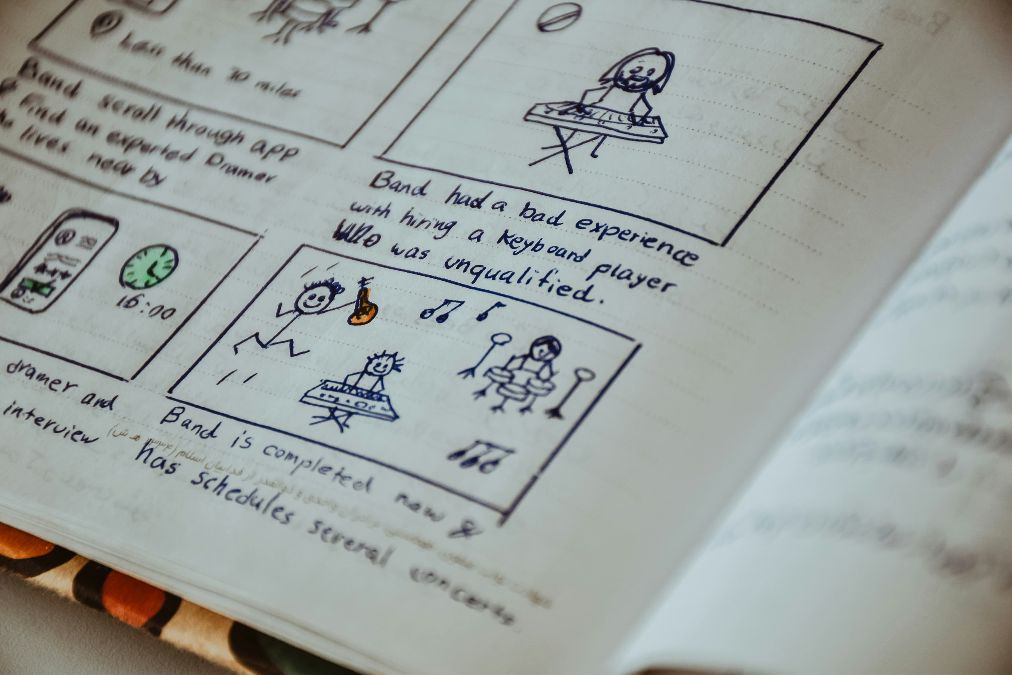 Storyboard sketches in a notebook — pre-production planning.